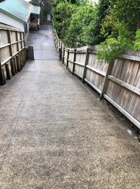 Washed paver path to a villa