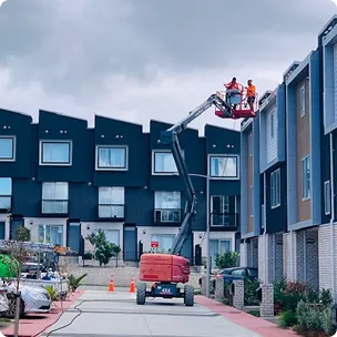 Elevated work platform at a townhouse complex