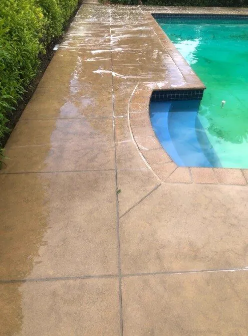 Pool surround being washed